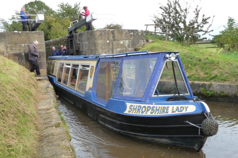 Shropshire Lady canal boat passing through a lock